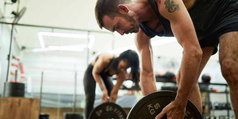 Loading weights onto bar